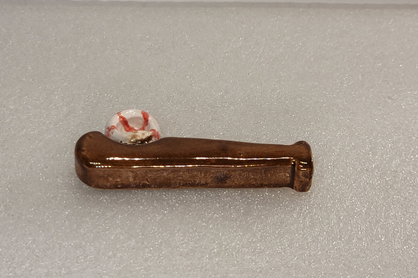 Swing and a Hit, brown, left side