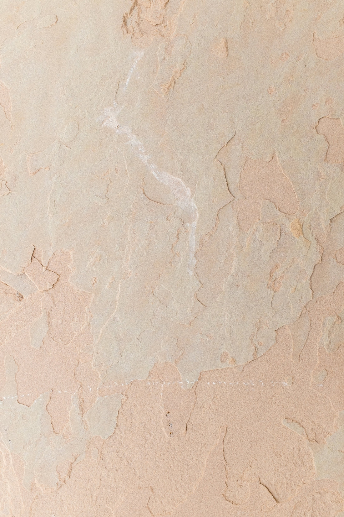 a close up of a wall with some paint on it